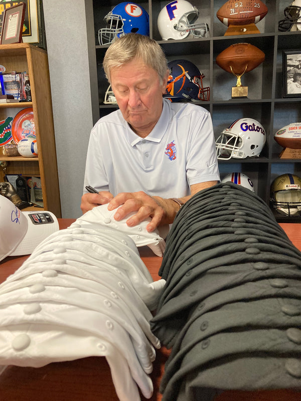 This is the opportunity you have been waiting on. The HBC, Steve Spurrier, will autograph and custom personalize your message on any of our merchandize items. Do you want to gift a personalized Visor, book, hat or even a shirt, it's simple as 1,2,3. This special is one of a kind! Pair this $60 offer to any item from shop.spurriers.com and have it personalized specifically to your liking! Classic HBC quippy quote, Happy Birthday or Congratulations. 