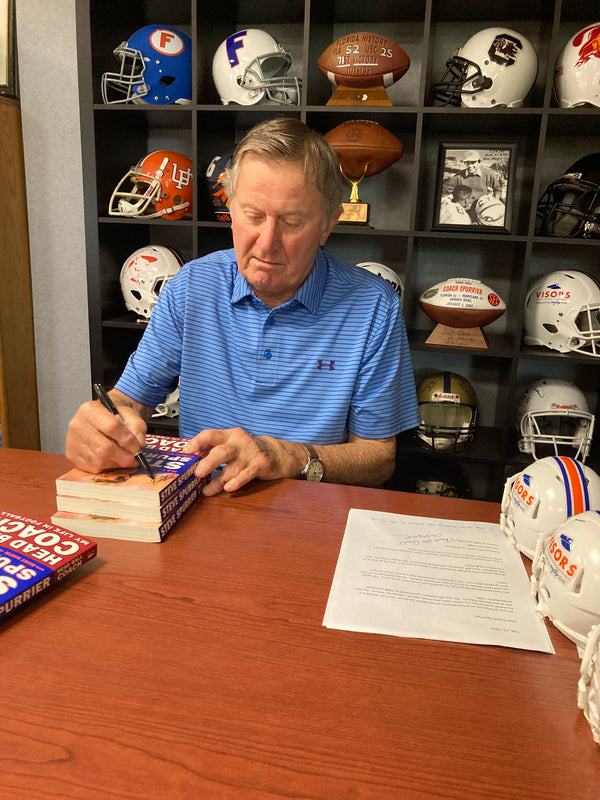 This is the opportunity you have been waiting on. The HBC, Steve Spurrier, will autograph and custom personalize your message on any of our merchandize items. Do you want to gift a personalized Visor, book, hat or even a shirt, it's simple as 1,2,3. This special is one of a kind! Pair this $60 offer to any item from shop.spurriers.com and have it personalized specifically to your liking! Classic HBC quippy quote, Happy Birthday or Congratulations. 