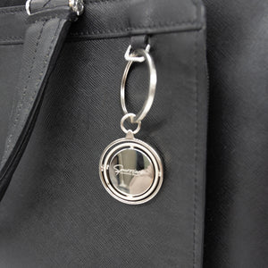 Bringing that Steve Spurrier spirit anywhere and everywhere has never been so stylish or sleek this embellishing keychain.  Available in a silver rectangle or chrome circle design.